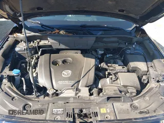 2018 Mazda CX-5 Grand Touring with VIN JM3KFADM1J0322049, listed as a IAAI auction lot 41891079 with 174,939 mi miles and . Bid and sale history available at DreamBid. Image 10.