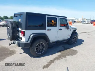 2013 Jeep Wrangler Unlimited Sport with VIN 1C4BJWDG4DL697208, listed as a IAAI auction lot 39507413 with 177,125 mi miles and . Bid and sale history available at DreamBid. Image 4.