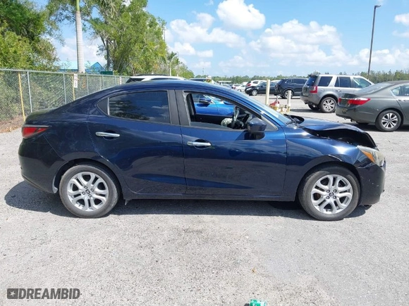 2017 Toyota Yaris iA with VIN 3MYDLBYV3HY151597, listed as a IAAI auction lot 41813004 with 90,684 mi miles. Bid and sale history available at carsss.com. Image 14.