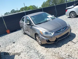 2014 Hyundai Accent GLS with VIN KMHCU4AE7EU736691, listed as a IAAI auction lot 42054514 with 80,715 mi miles. Bid and sale history available at carsss.com. Image 1.