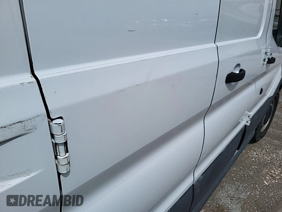 2016 Ford Transit Cargo with VIN 1FTYE1ZM1GKA06047, listed as a IAAI auction lot 42679265 with 124,601 mi miles and . Bid and sale history available at DreamBid. Image 23.
