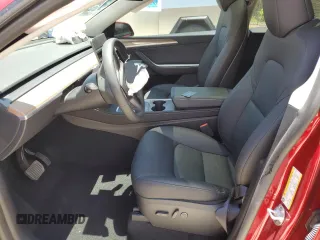 2024 Tesla Model Y Long Range с VIN 7SAYGDEE4RA325145, выставлен на аукционе Copart как лот 61132955 с пробегом 16 659 миль миль и Списание • Salvage title. История ставок и продаж доступна на DreamBid. Изображение 7.