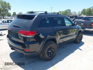 2017 Jeep Grand Cherokee Trailhawk with VIN 1C4RJFLG3HC836072, listed as a IAAI auction lot 42073775 with 139,374 mi miles and . Bid and sale history available at DreamBid. Image 4.