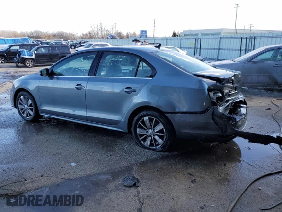 2015 Volkswagen Jetta Sedan 1.8T SE with VIN 3VWD07AJ7FM267463, listed as a Copart auction lot 89084895 with 106,789 mi miles and Salvage Title. Bid and sale history available at carsss.com. Image 2.