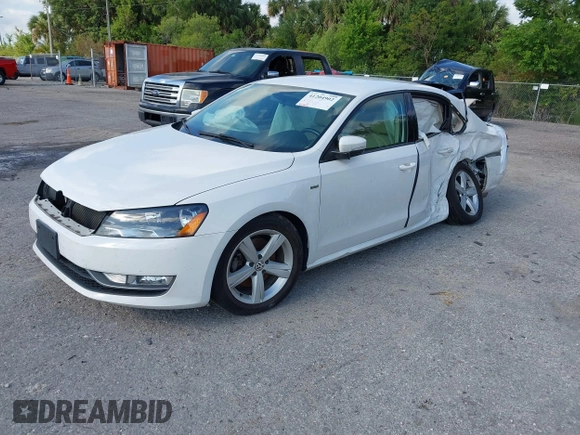 2015 Volkswagen Passat 1.8T Limited Edition with VIN 1VWAT7A3XFC100852, listed as a IAAI auction lot 41204902 with 85,725 mi miles. Bid and sale history available at carsss.com. Image 2.