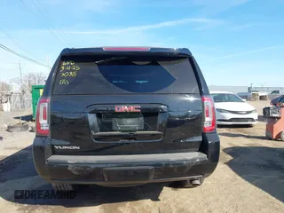 2016 GMC Yukon SLT with VIN 1GKS2BKC5GR253038, listed as a IAAI auction lot 41790030 with 101,039 mi miles. Bid and sale history available at carsss.com. Image 16.