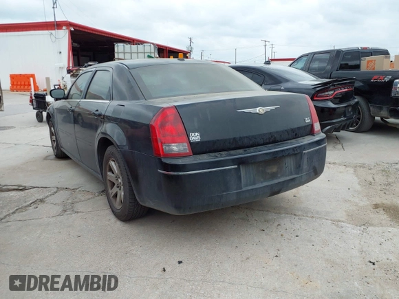 2006 Chrysler 300 Touring with VIN 2C3KA53G36H432859, listed as a IAAI auction lot 42141903 with 270,699 mi miles. Bid and sale history available at carsss.com. Image 3.