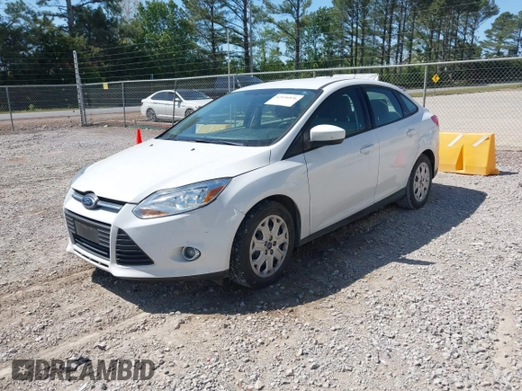 2012 Ford Focus SE with VIN 1FAHP3F22CL381061, listed as a IAAI auction lot 42036836 with 130,437 mi miles. Bid and sale history available at carsss.com. Image 2.