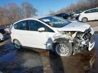 2016 Ford C-Max Energi SEL with VIN 1FADP5CU2GL118381, listed as a IAAI auction lot 41516426 with 220,361 mi miles. Bid and sale history available at carsss.com. Image 13.