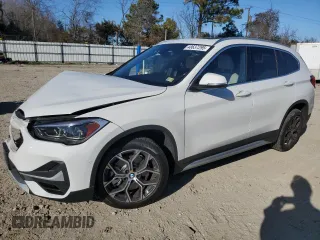 2021 BMW X1 xDrive28i with VIN WBXJG9C07M5U27350, listed as a Copart auction lot 48637295 with 22,202 mi miles and Salvage Title. Bid and sale history available at carsss.com. Image 1.