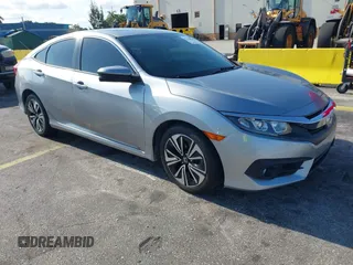 2016 Honda Civic EX-L z VIN 2HGFC1F75GH639896, wystawiony jako IAAI lot #42224262 z przebiegiem 64 463 mil mil oraz . Historia ofert i sprzedaży dostępna na DreamBid. Obrazek 1.