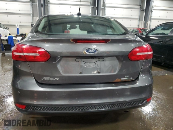 2016 Ford Focus SE z VIN 1FADP3F27GL216059, wystawiony jako Copart lot #59611395 z przebiegiem 170 468 mil mil oraz Szkoda całkowita • Salvage title. Historia ofert i sprzedaży dostępna na DreamBid. Obrazek 6.