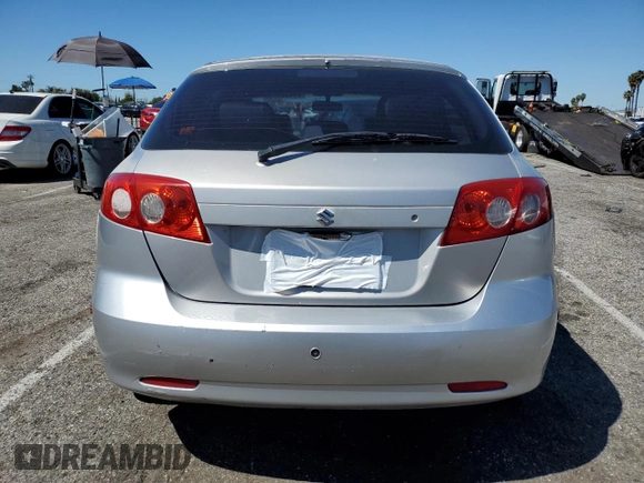 2006 Suzuki Reno z VIN KL5JD66Z36K455929, wystawiony jako Copart lot #49444974 z przebiegiem Nie podano mil oraz Szkoda całkowita • Salvage title. Historia ofert i sprzedaży dostępna na DreamBid. Obrazek 6.