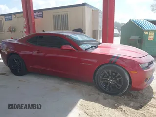 2014 Chevrolet Camaro LS z VIN 2G1FA1E32E9147104, wystawiony jako IAAI lot #42324064 z przebiegiem 70 585 mil mil oraz . Historia ofert i sprzedaży dostępna na DreamBid. Obrazek 13.