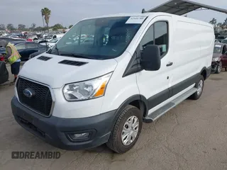 2021 Ford Transit Cargo with VIN 1FTBR1Y85MKA69355, listed as a IAAI auction lot 42544780 with 33,288 mi miles and . Bid and sale history available at DreamBid. Image 17.