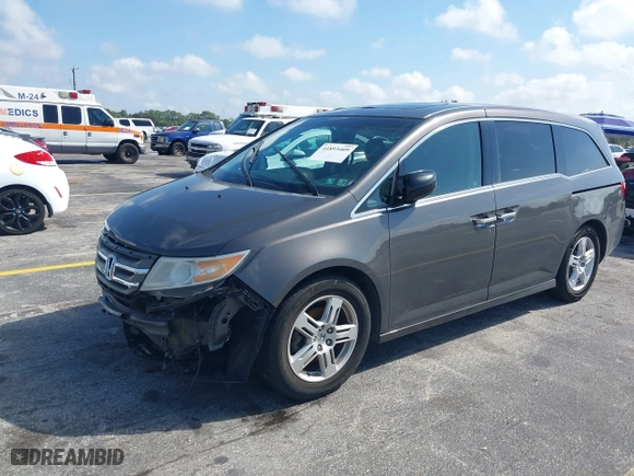 2012 Honda Odyssey Touring with VIN 5FNRL5H96CB087780, listed as a IAAI auction lot 41893409 with 1 mi miles. Bid and sale history available at carsss.com. Image 19.