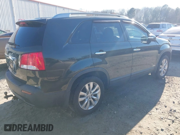 2011 Kia Sorento EX with VIN 5XYKUDA25BG093924, listed as a IAAI auction lot 41648802 with 221,355 mi miles. Bid and sale history available at carsss.com. Image 4.