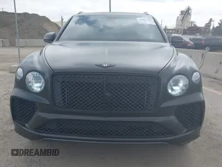 2021 Bentley Bentayga V8 z VIN SJAAM2ZV5MC038171, wystawiony jako IAAI lot #42057762 z przebiegiem 25 973 mil mil oraz . Historia ofert i sprzedaży dostępna na DreamBid. Obrazek 12.