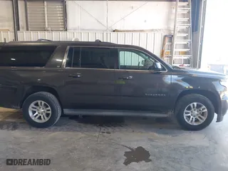 2015 Chevrolet Suburban LT with VIN 1GNSKJKC5FR264018, listed as a IAAI auction lot 42056645 with 194,479 mi miles. Bid and sale history available at carsss.com. Image 13.