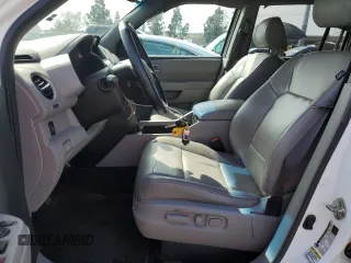 2014 Honda Pilot EX-L with VIN 5FNYF3H52EB005809, listed as a Copart auction lot 49451195 with 147,181 mi miles and Salvage Title. Bid and sale history available at DreamBid. Image 7.