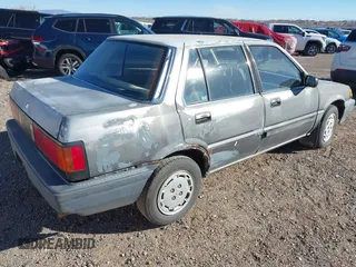 1985 Honda Civic z VIN JHMAK5433FS009299, wystawiony jako IAAI lot #41576709 z przebiegiem 152 094 mil mil oraz . Historia ofert i sprzedaży dostępna na DreamBid. Obrazek 4.