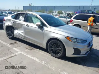 2019 Ford Fusion Hybrid SE with VIN 3FA6P0LU4KR268983, listed as a IAAI auction lot 42033246 with 79,551 mi miles. Bid and sale history available at carsss.com. Image 1.