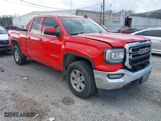 2016 GMC Sierra 1500 SLE with VIN 1GTV2MEC0GZ158533, listed as a IAAI auction lot 41226058 with 124,090 mi miles. Bid and sale history available at carsss.com. Image 1.