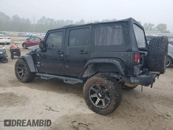 2015 Jeep Wrangler Unlimited Freedom with VIN 1C4BJWDG6FL568583, listed as a Copart auction lot 54266315 with Not provided miles and Salvage title. Bid and sale history available at DreamBid. Image 2.