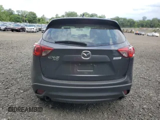 2015 Mazda CX-5 Sport with VIN JM3KE4BYXF0511249, listed as a Copart auction lot 63310695 with 208,615 mi miles and Salvage title. Bid and sale history available at DreamBid. Image 6.