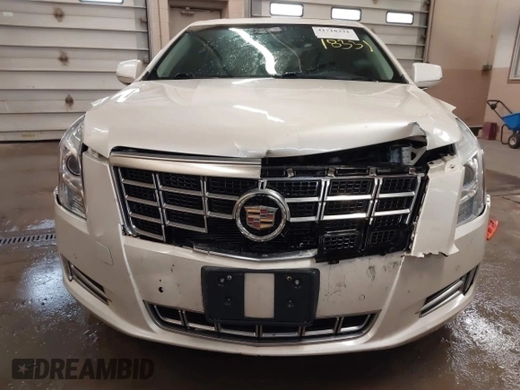 2013 Cadillac XTS Luxury with VIN 2G61R5S37D9152726, listed as a IAAI auction lot 41718331 with 88,189 mi miles and . Bid and sale history available at DreamBid. Image 11.