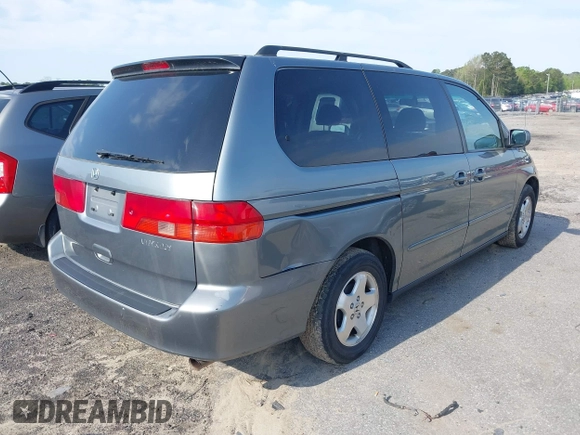 2001 Honda Odyssey EX z VIN 2HKRL18601H532141, wystawiony jako IAAI lot #41981052 z przebiegiem 126 931 mil mil oraz . Historia ofert i sprzedaży dostępna na DreamBid. Obrazek 4.