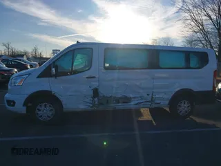 2021 Ford Transit Passenger XL with VIN 1FBAX2Y87MKA64167, listed as a IAAI auction lot 41087474 with 67,242 mi miles and . Bid and sale history available at DreamBid. Image 14.