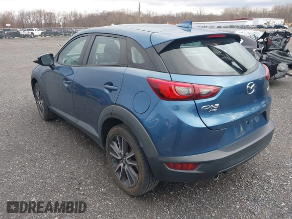 2018 Mazda CX-3 Touring with VIN JM1DKFC78J0322460, listed as a IAAI auction lot 41730662 with 58,841 mi miles. Bid and sale history available at carsss.com. Image 3.