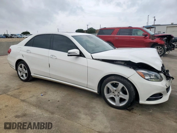 2014 Mercedes-Benz E 350 Sport with VIN WDDHF5KB8EA853525, listed as a Copart auction lot 55132715 with 125,895 mi miles and Salvage title. Bid and sale history available at DreamBid. Image 4.