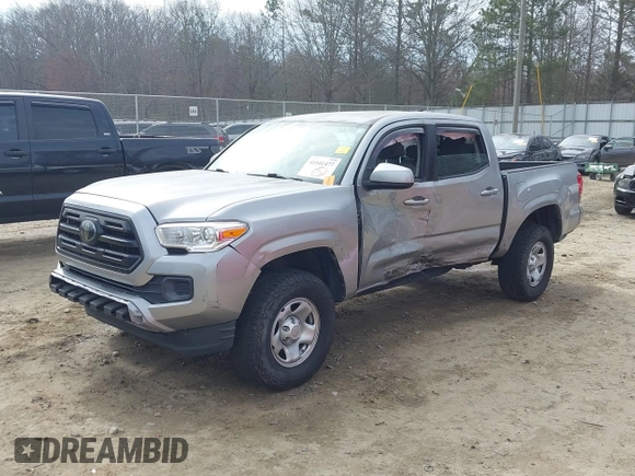 2018 Toyota Tacoma SR with VIN 3TMCZ5AN4JM130307, listed as a IAAI auction lot 41541477 with 74,369 mi miles and . Bid and sale history available at DreamBid. Image 2.
