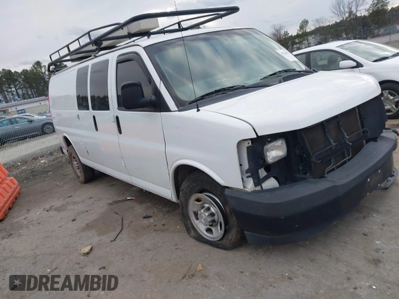 2017 Chevrolet Express Cargo Van with VIN 1GCWGBFG4H1348685, listed as a IAAI auction lot 41234959 with 215,067 mi miles. Bid and sale history available at carsss.com. Image 1.