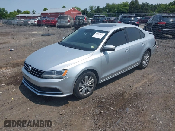 2015 Volkswagen Jetta SE with VIN 3VWD17AJ7FM421327, listed as a IAAI auction lot 42409413 with 150,319 mi miles and . Bid and sale history available at DreamBid. Image 2.