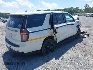 2022 Chevrolet Tahoe Commercial z VIN 1GNSCLED4NR222340, wystawiony jako IAAI lot #42321388 z przebiegiem Nie podano mil oraz . Historia ofert i sprzedaży dostępna na DreamBid. Obrazek 4.