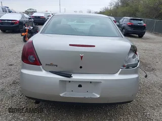 2006 Pontiac G6 6-Cyl z VIN 1G2ZG558064154096, wystawiony jako IAAI lot #41987316 z przebiegiem 221 130 mil mil oraz . Historia ofert i sprzedaży dostępna na DreamBid. Obrazek 17.