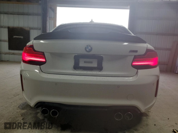 2018 BMW M2 z VIN WBS1J5C5XJVD37006, wystawiony jako Copart lot #71951884 z przebiegiem 52 530 mil mil oraz Szkoda całkowita • Salvage title. Historia ofert i sprzedaży dostępna na DreamBid. Obrazek 6.