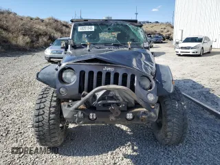 2014 Jeep Wrangler Unlimited Rubicon with VIN 1C4BJWFG0EL274480, listed as a Copart auction lot 48201845 with 130,503 mi miles and Salvage Title. Bid and sale history available at carsss.com. Image 5.