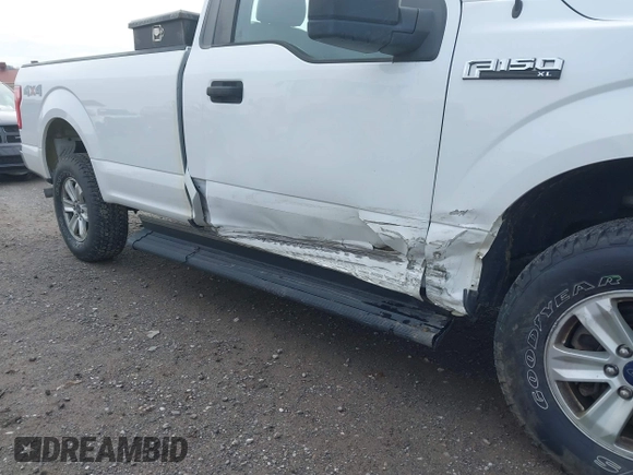 2016 Ford F-150 XL with VIN 1FTMF1EF4GKE09829, listed as a IAAI auction lot 41947402 with 124,150 mi miles and . Bid and sale history available at DreamBid. Image 6.