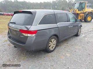 2016 Honda Odyssey SE with VIN 5FNRL5H36GB038533, listed as a IAAI auction lot 41610306 with 192,543 mi miles. Bid and sale history available at carsss.com. Image 4.