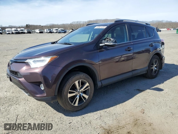 2018 Toyota RAV4 XLE with VIN 2T3RFREVXJW851654, listed as a Copart auction lot 48961055 with 166,664 mi miles and Salvage Title. Bid and sale history available at DreamBid. Image 1.