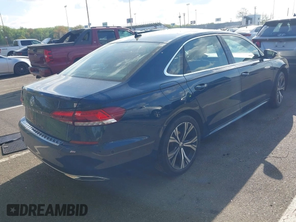 2021 Volkswagen Passat SE with VIN 1VWSA7A36MC010749, listed as a IAAI auction lot 42141065 with 43,571 mi miles and . Bid and sale history available at DreamBid. Image 4.