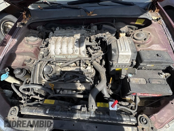 2005 Hyundai XG z VIN KMHFU45E95A381631, wystawiony jako Copart lot #57705005 z przebiegiem 202 730 mil mil oraz Tytuł czysty. Historia ofert i sprzedaży dostępna na DreamBid. Obrazek 7.