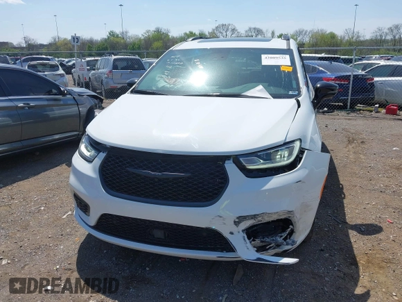 2023 Chrysler Pacifica Limited with VIN 2C4RC1GG6PR540220, listed as a IAAI auction lot 42009535 with 29,339 mi miles and . Bid and sale history available at DreamBid. Image 6.