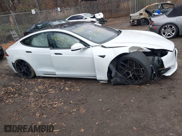 2020 Tesla Model S Long Range with VIN 5YJSA1E23LF389065, listed as a IAAI auction lot 41131372 with Not Provided miles. Bid and sale history available at carsss.com. Image 13.