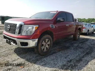 2017 Nissan Titan SV z VIN 1N6AA1EJ8HN573992, wystawiony jako Copart lot #57311915 z przebiegiem 216 138 mil mil oraz Tytuł czysty. Historia ofert i sprzedaży dostępna na DreamBid. Obrazek 1.