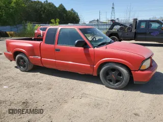 2000 GMC Sonoma SLS z VIN 1GTCS19W0Y8262960, wystawiony jako Copart lot #56512435 z przebiegiem 243 662 mil mil oraz Tytuł czysty. Historia ofert i sprzedaży dostępna na DreamBid. Obrazek 4.
